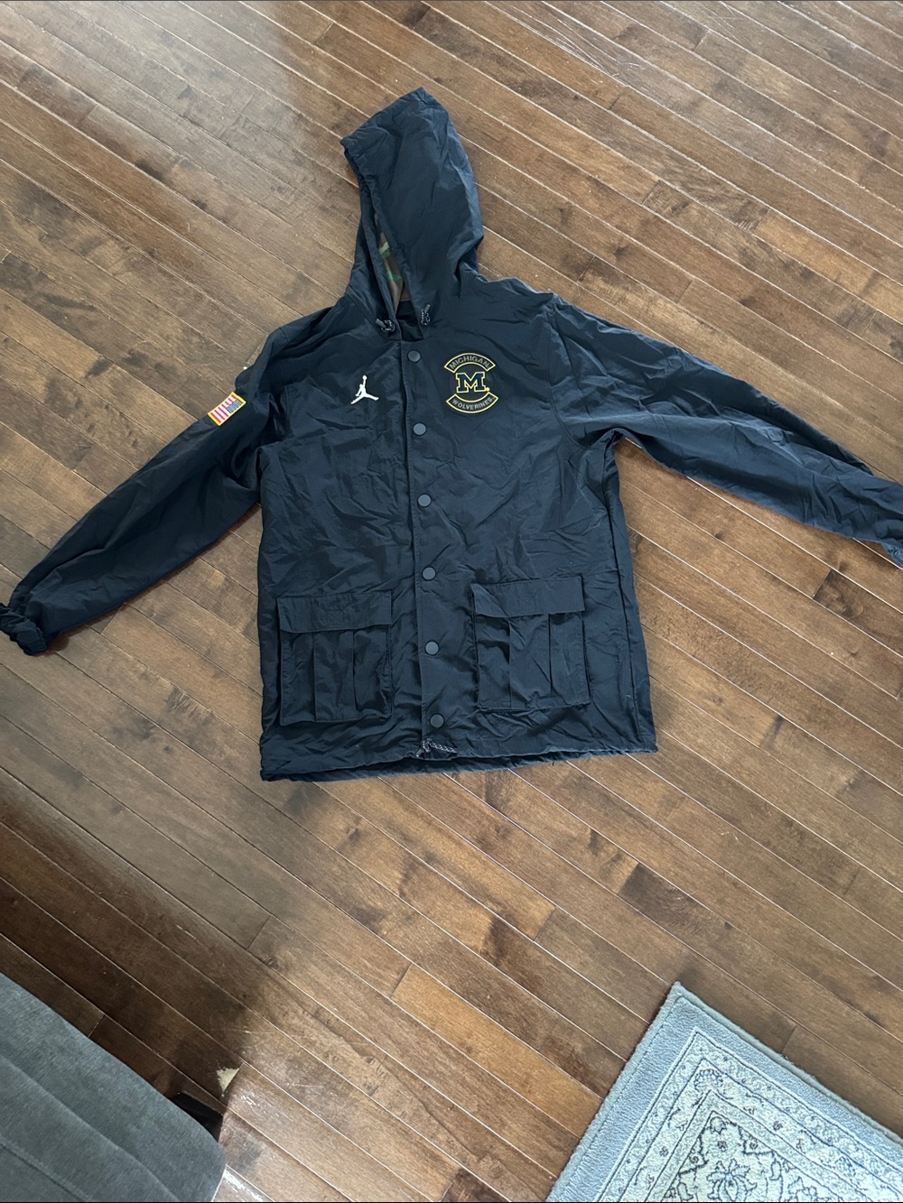Jordan Black Hooded Windbreaker with Gold Patch
